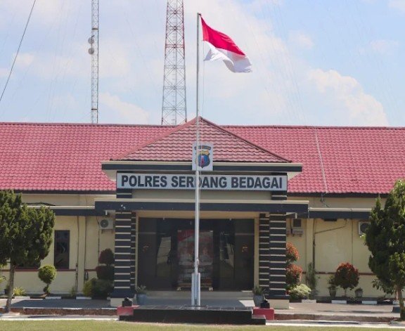 The village chief of Tanjung Harap has filed a fraud complaint with the police.